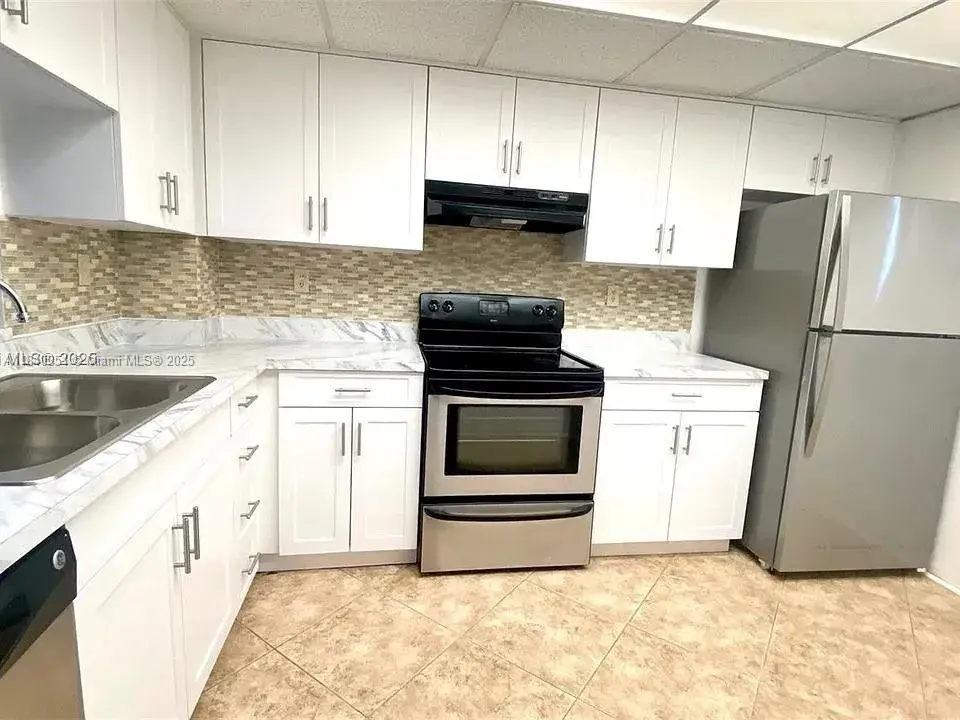 1200 NW 87th Ave # 410, Coral Springs FL 33071