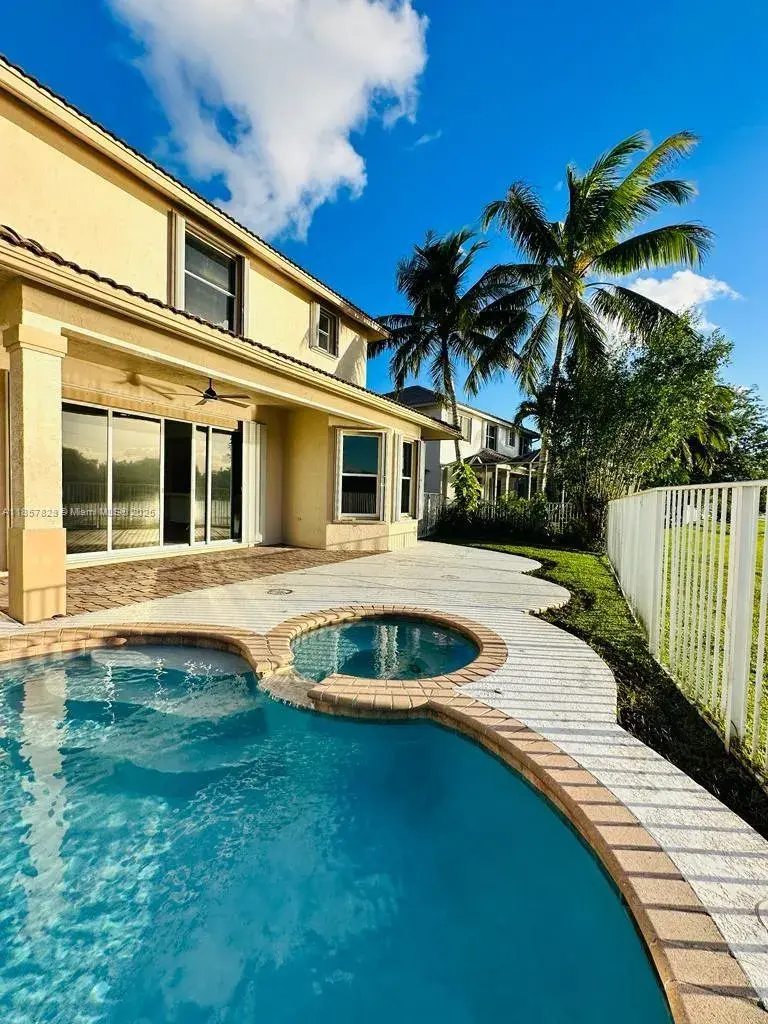 6 bedroom 4 bath Residential for sale at 1887 Harbor View Cir, Weston FL 33327