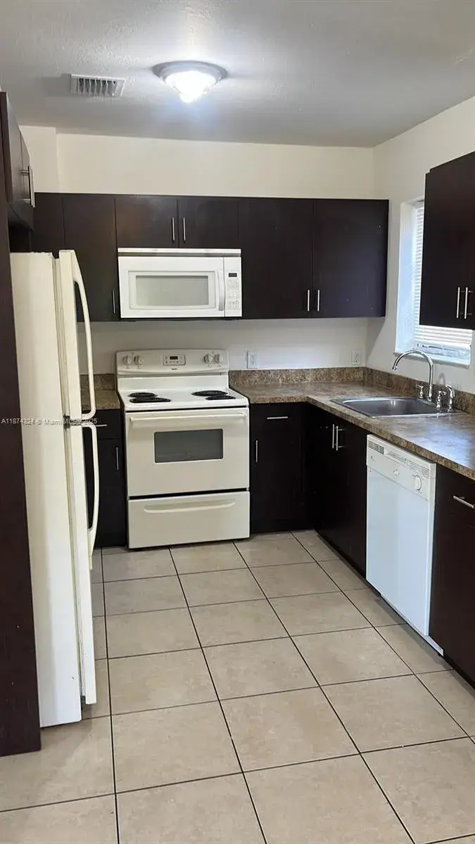 4 bedroom 2 bath Residential Lease for rent at 1642 NW 14th St, Fort Lauderdale FL 33311