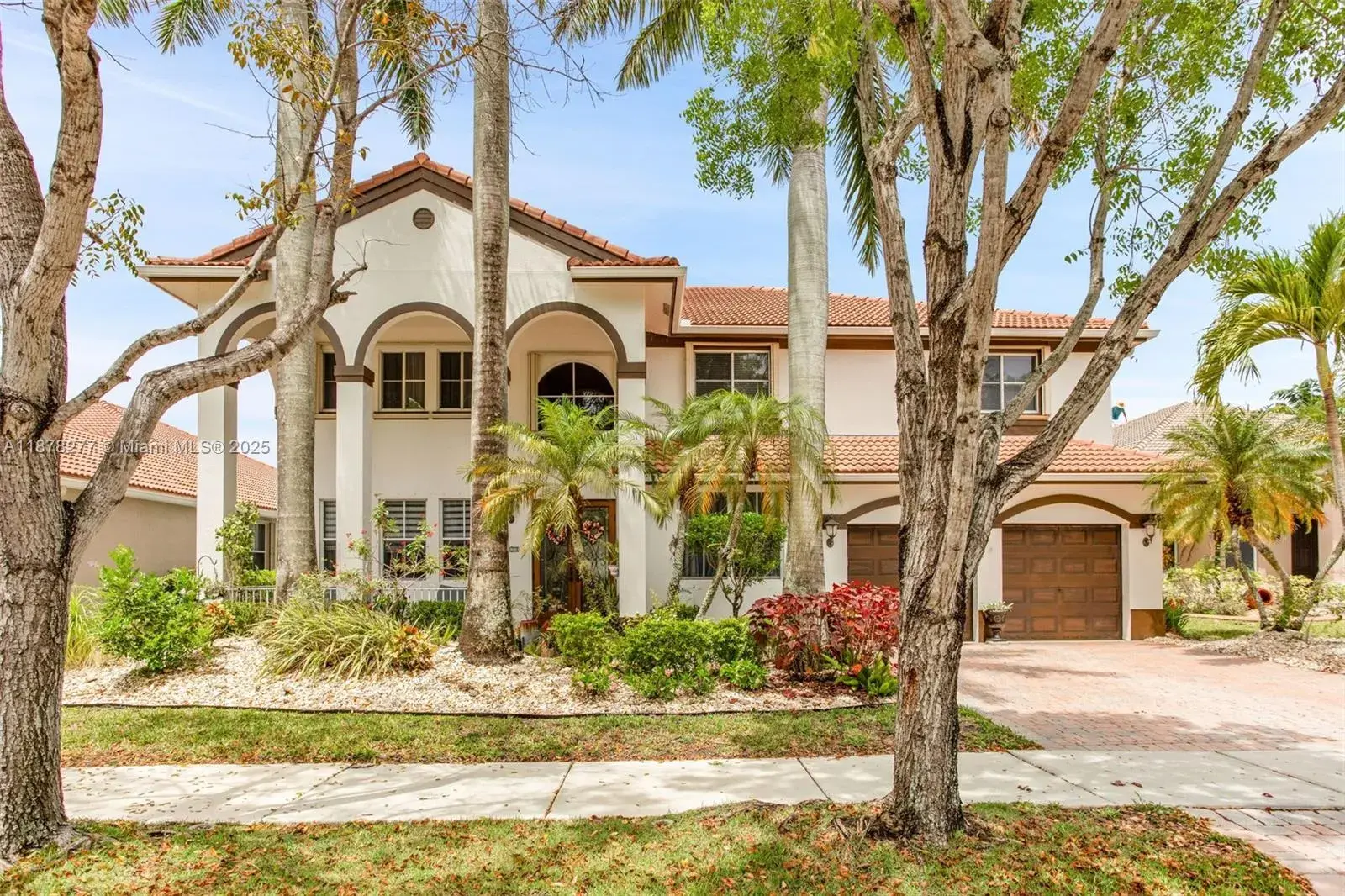6 bedroom 5 bath Residential for sale at 1242 Peregrine Way, Weston FL 33327