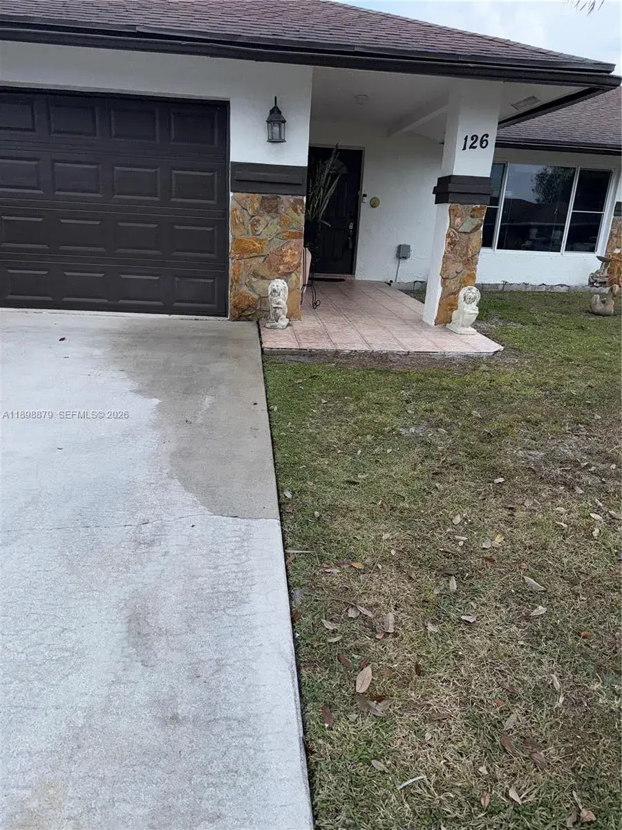 126 Sunflower Cir, Royal Palm Beach FL 33411