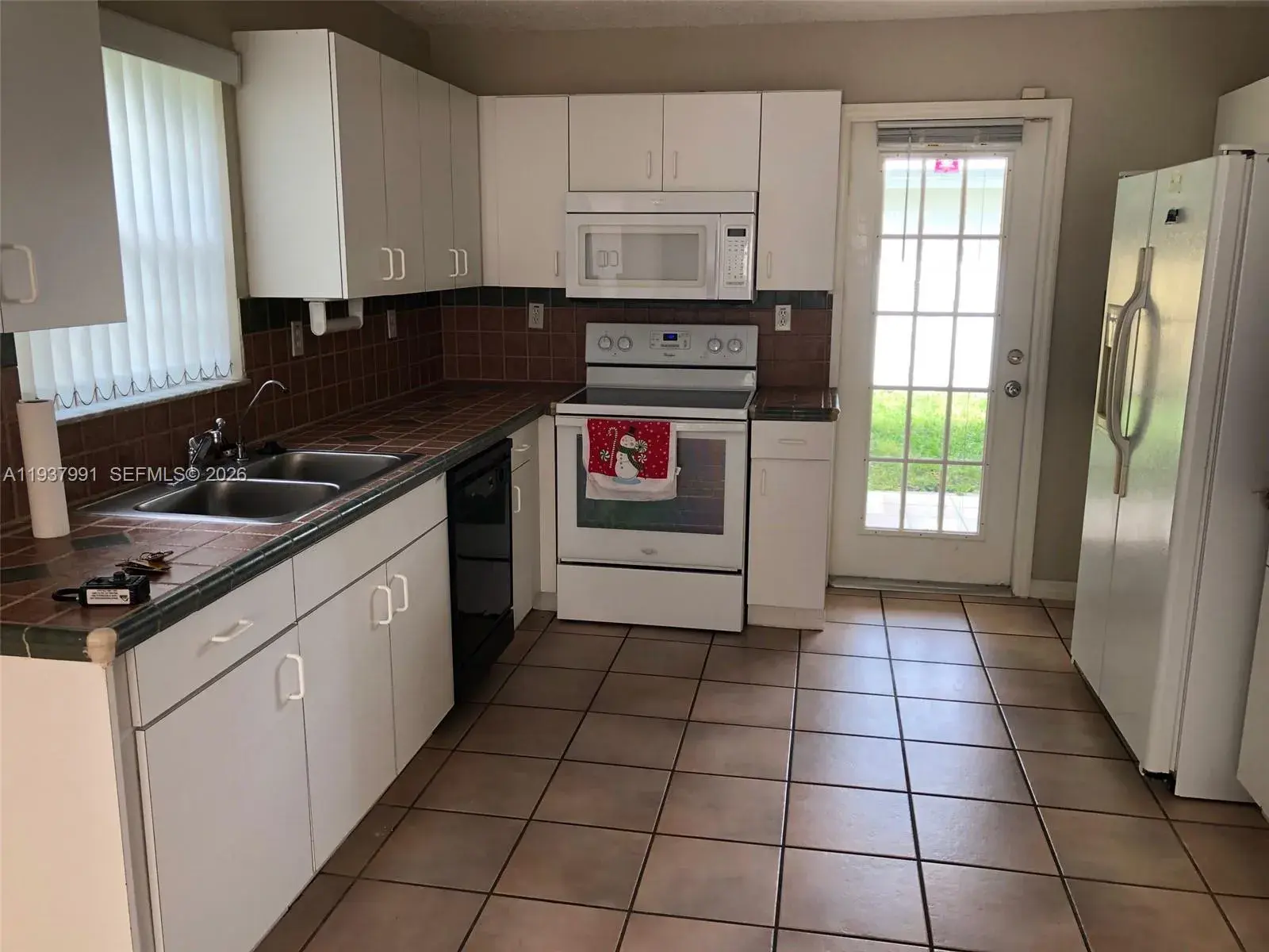 11274 SW 64 LN, Miami FL 33173