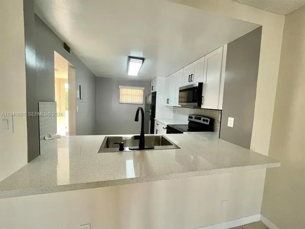 1100 NW 87th Ave # 403, Coral Springs FL 33071