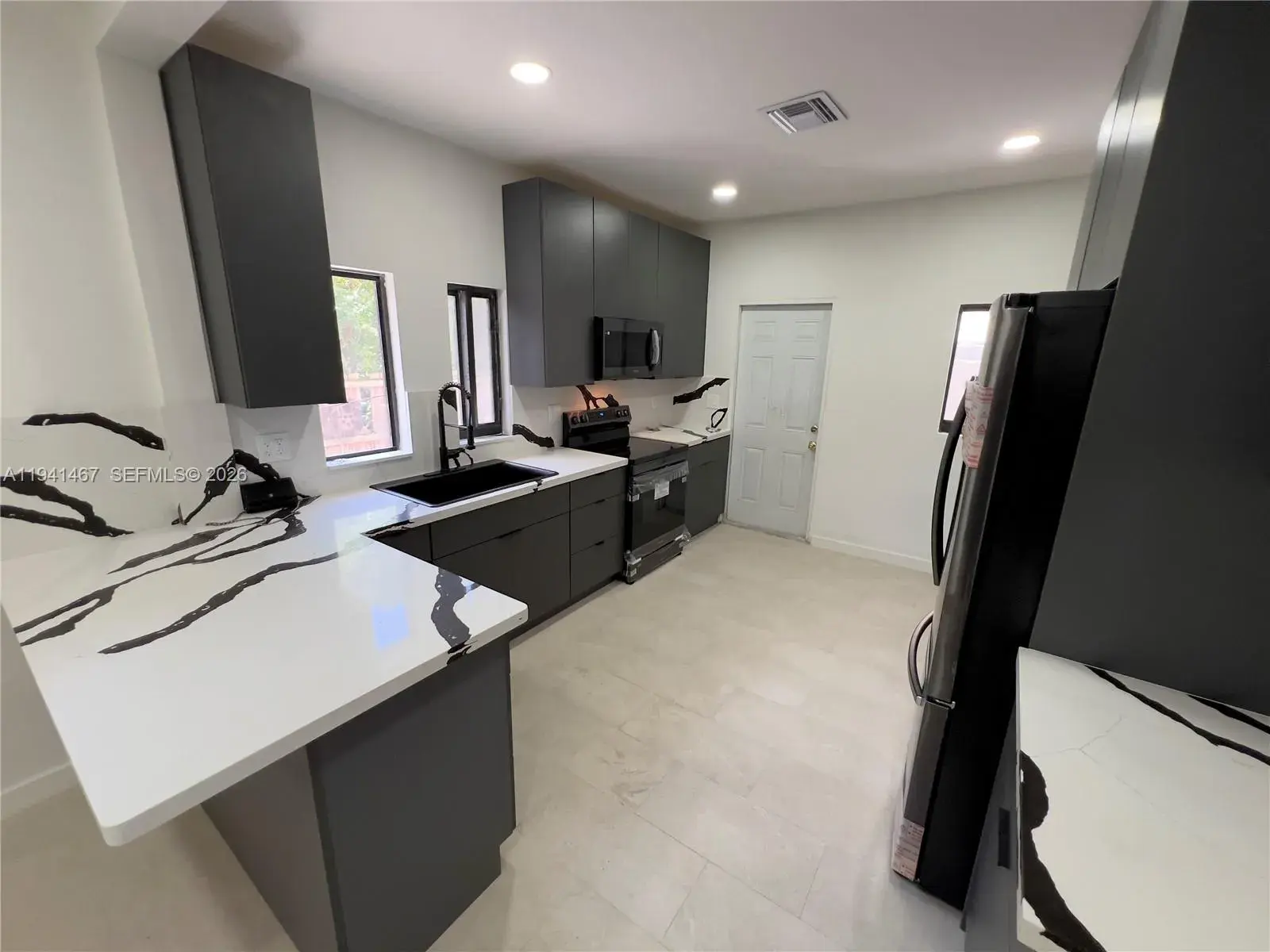 418 NW 9th Ave, Miami FL 33128
