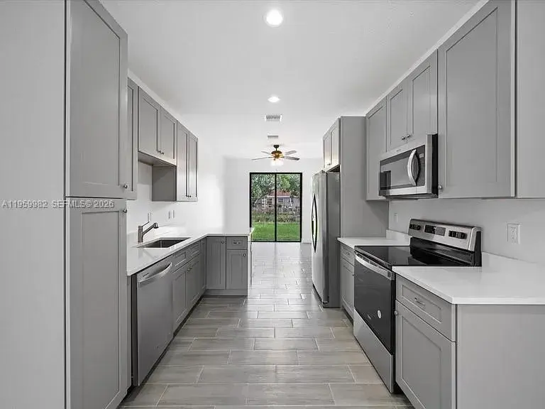 5 bedroom 2 bath Residential for sale at 141 W 16th St, Riviera Beach FL 33404