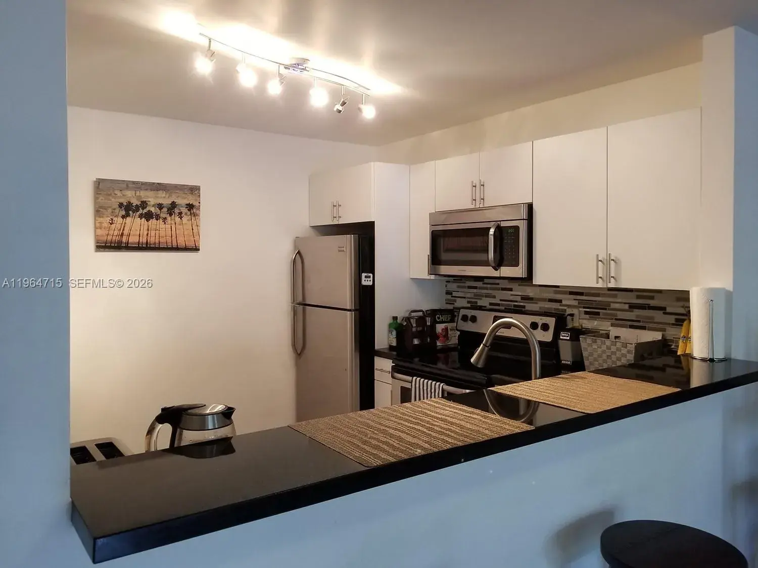 7845 CAMINO REAL # 210, Miami FL 33143