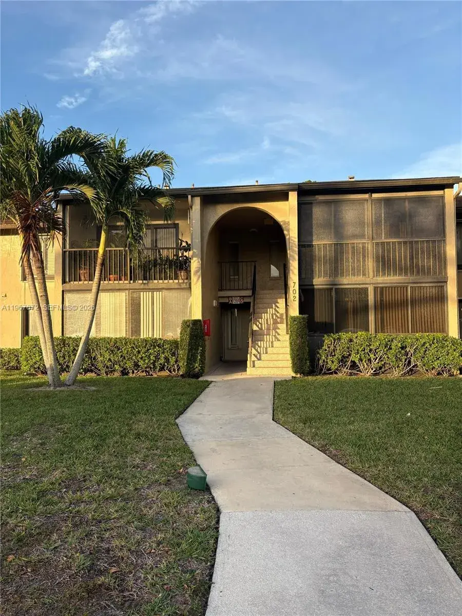 3 bedroom 2 bath Residential for sale at 702 Sunny Pine Way # A1, Green Acres FL 33415