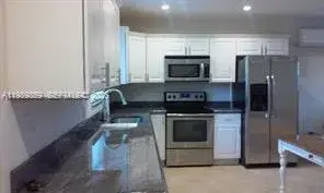 5 bedroom 3 bath Residential for sale at 2311 NW 7th St, Fort Lauderdale FL 33311