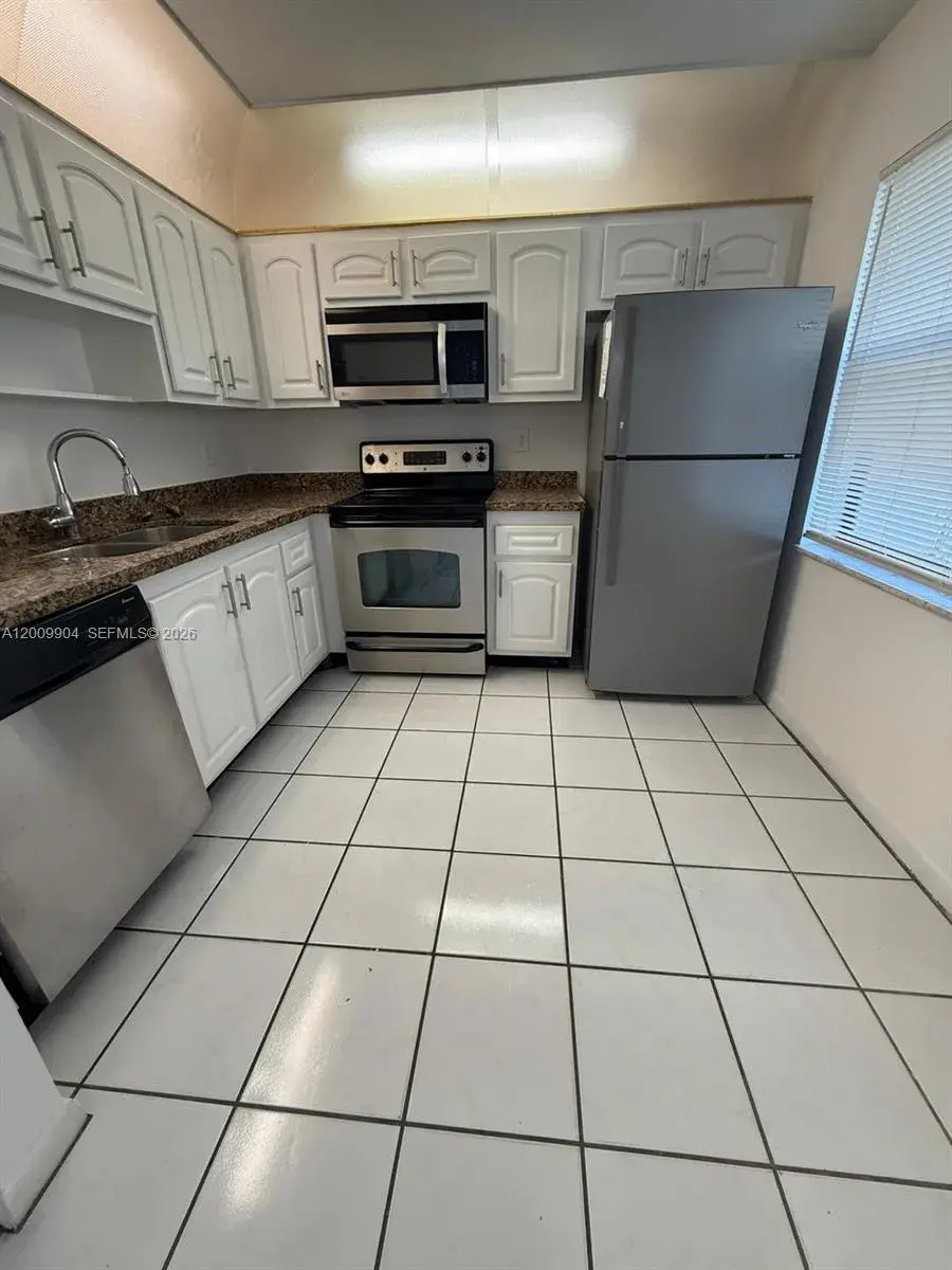 4 bedroom 2 bath Residential for sale at 16413 Grape Way, Delray Beach FL 33484