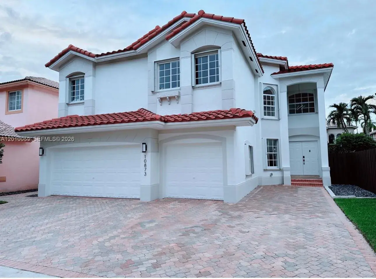 5 bedroom 3 bath Residential for sale at 10873 NW 71st St, Doral FL 33178