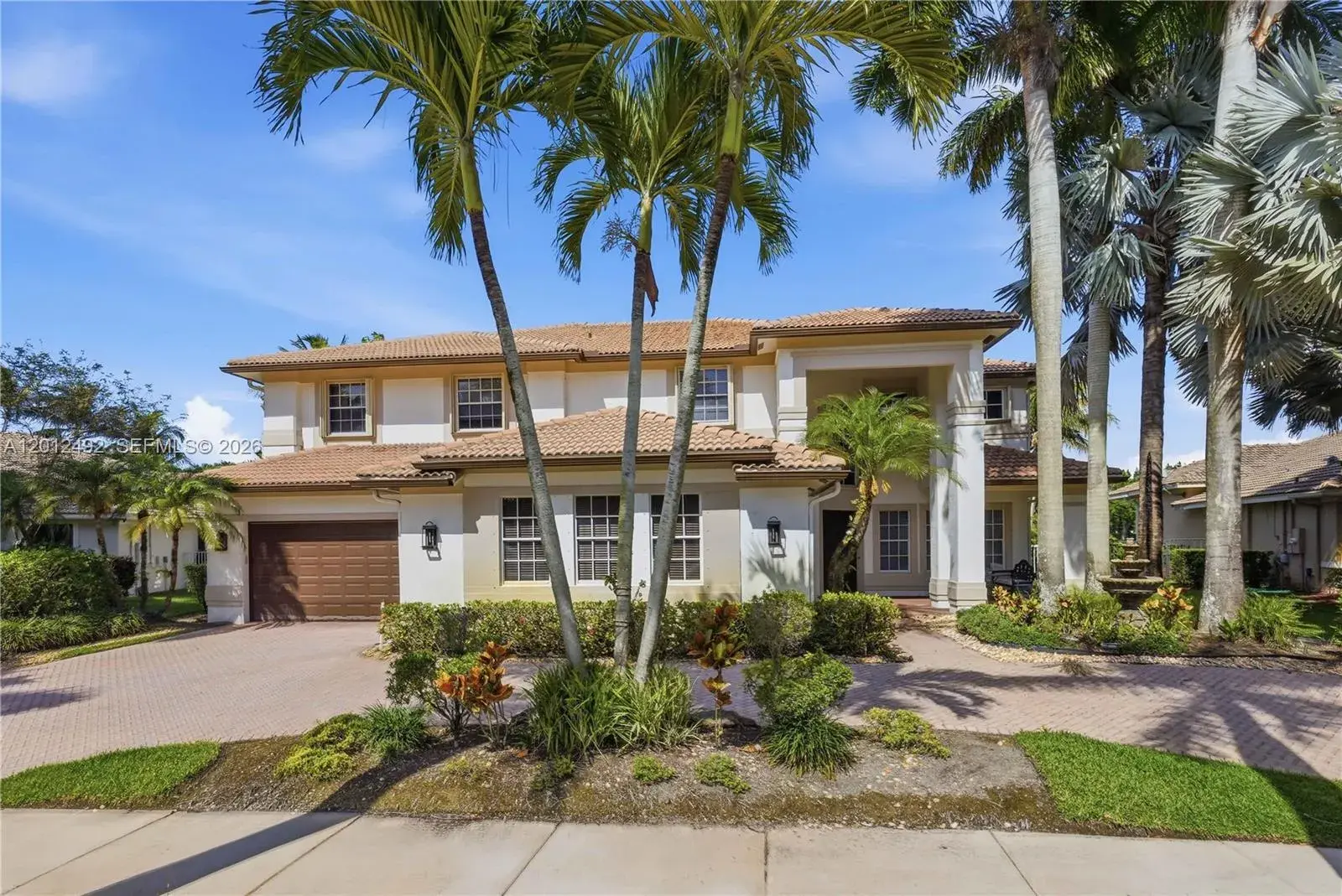 6 bedroom 4 bath for sale at 1422 Victoria Isle Dr, Weston FL 33327