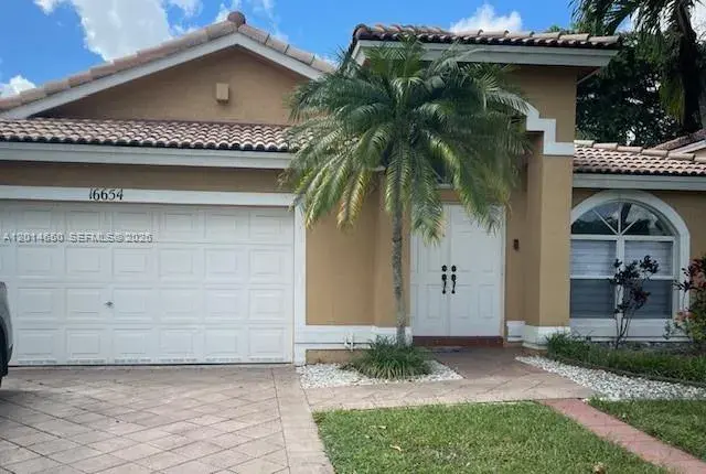 4 bedroom 2 bath Residential for sale at 16654 SW 103rd Ln, Miami FL 33196