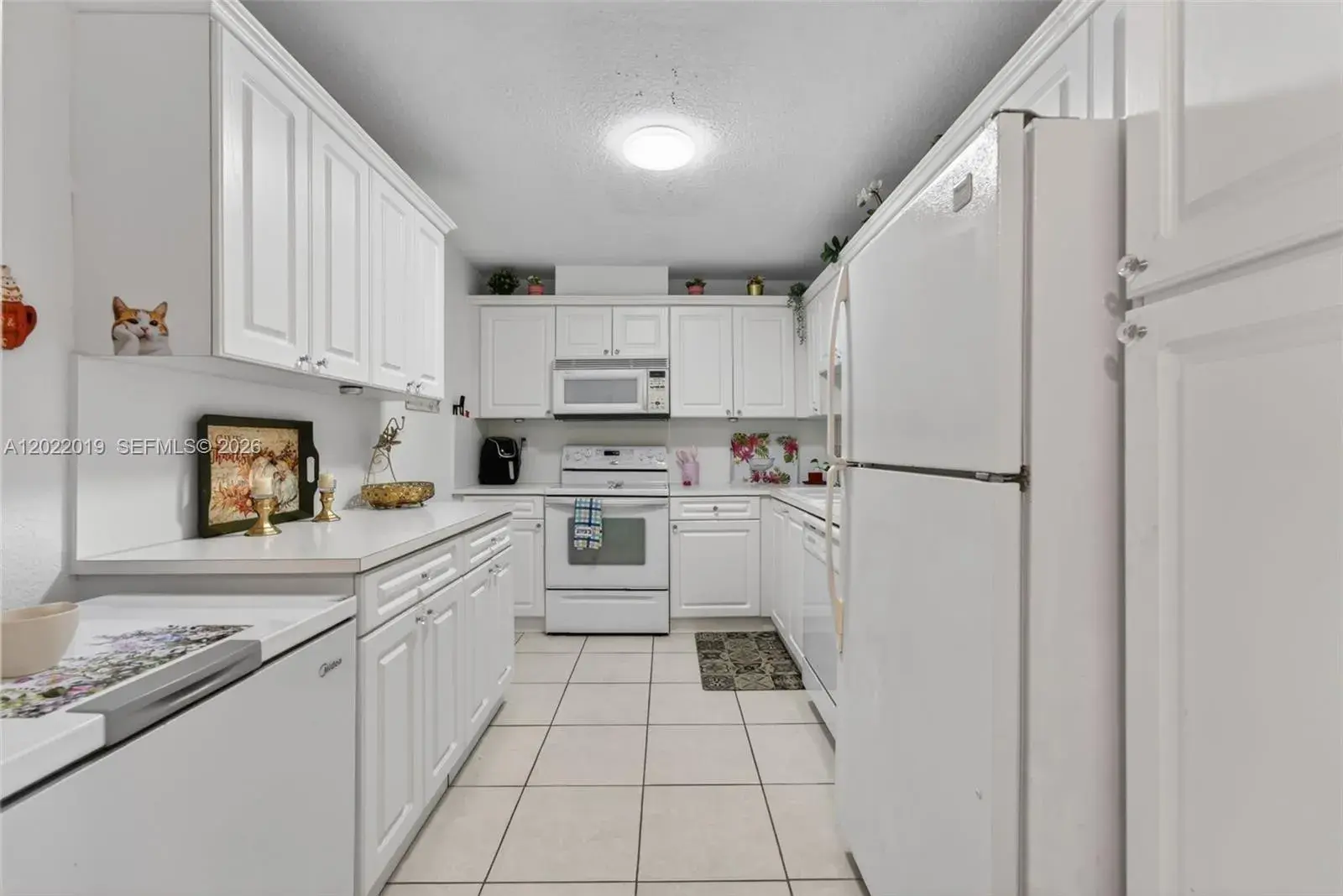 10777 W Sample Rd # 209, Coral Springs FL 33065