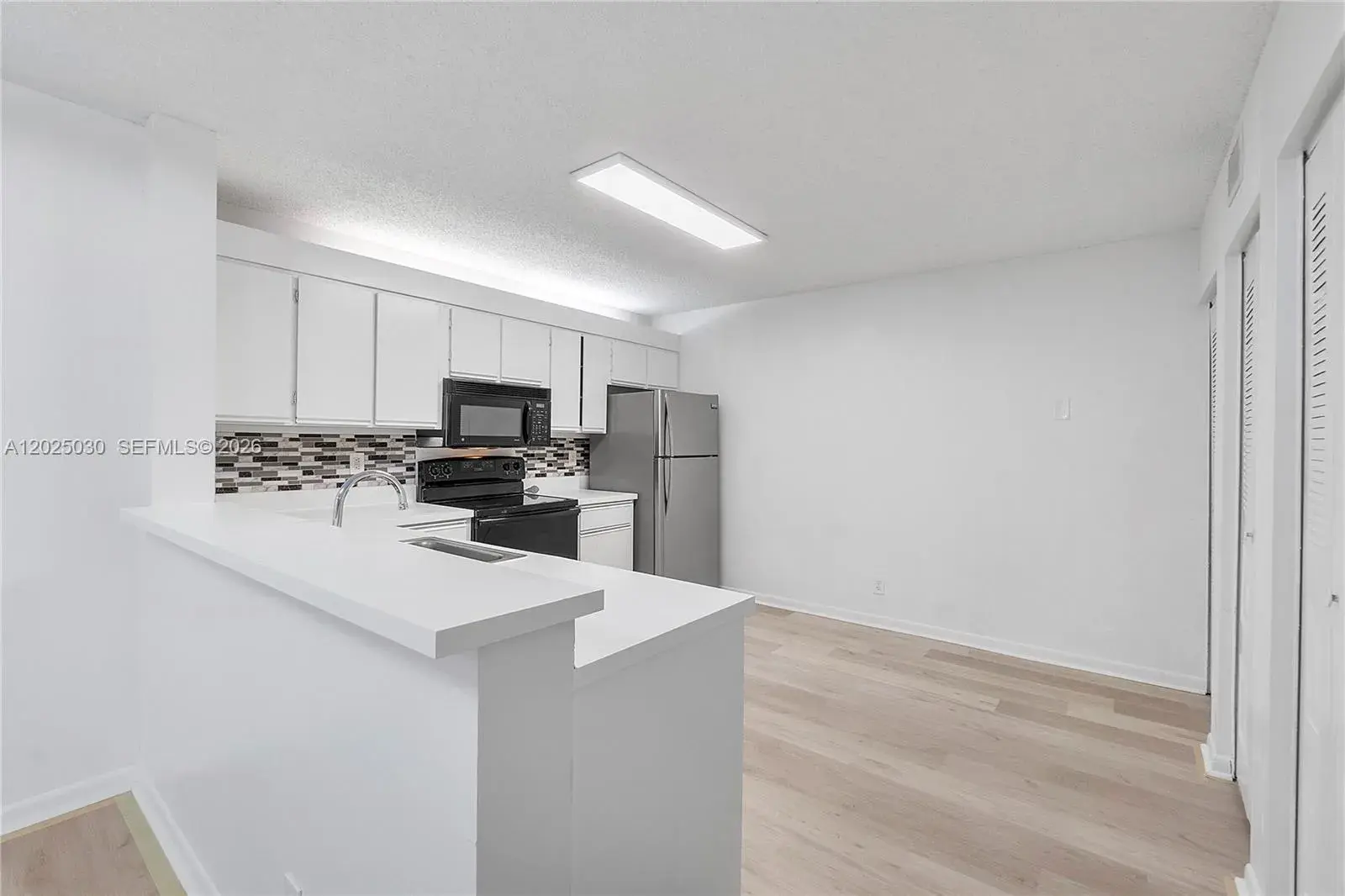 5661 Riverside Dr, Coral Springs FL 33067