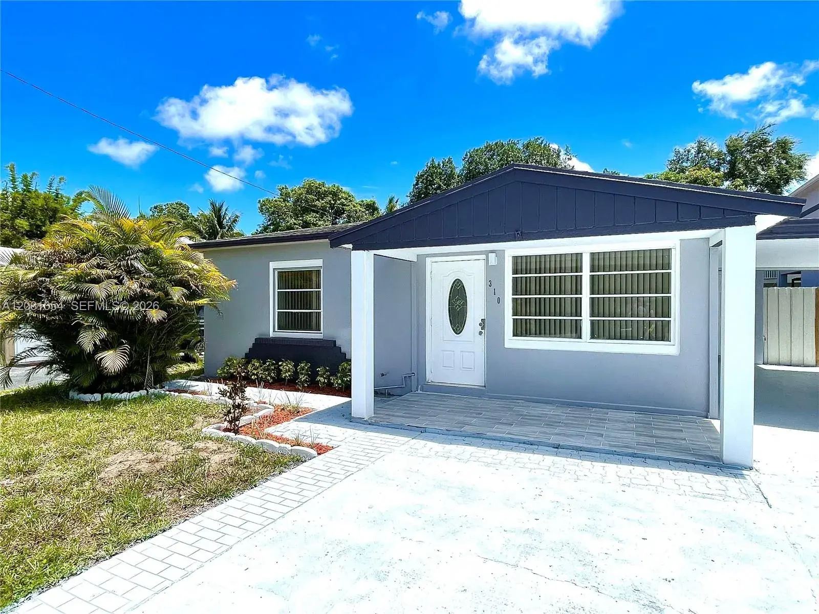 4 bedroom 2 bath Residential for sale at 310 SW 10th St, Fort Lauderdale FL 33315