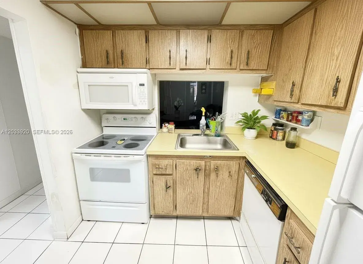 2800 NW 56th Ave # F201, Lauderhill FL 33313