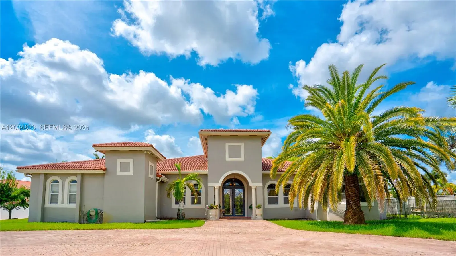 5 bedroom 4 bath for sale at 9810 NW 137th St, Hialeah Gardens FL 33018