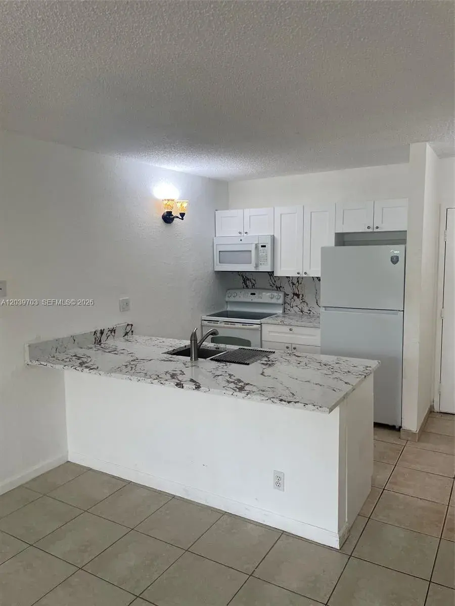 2401 Riverside Dr # B, Coral Springs FL 33065