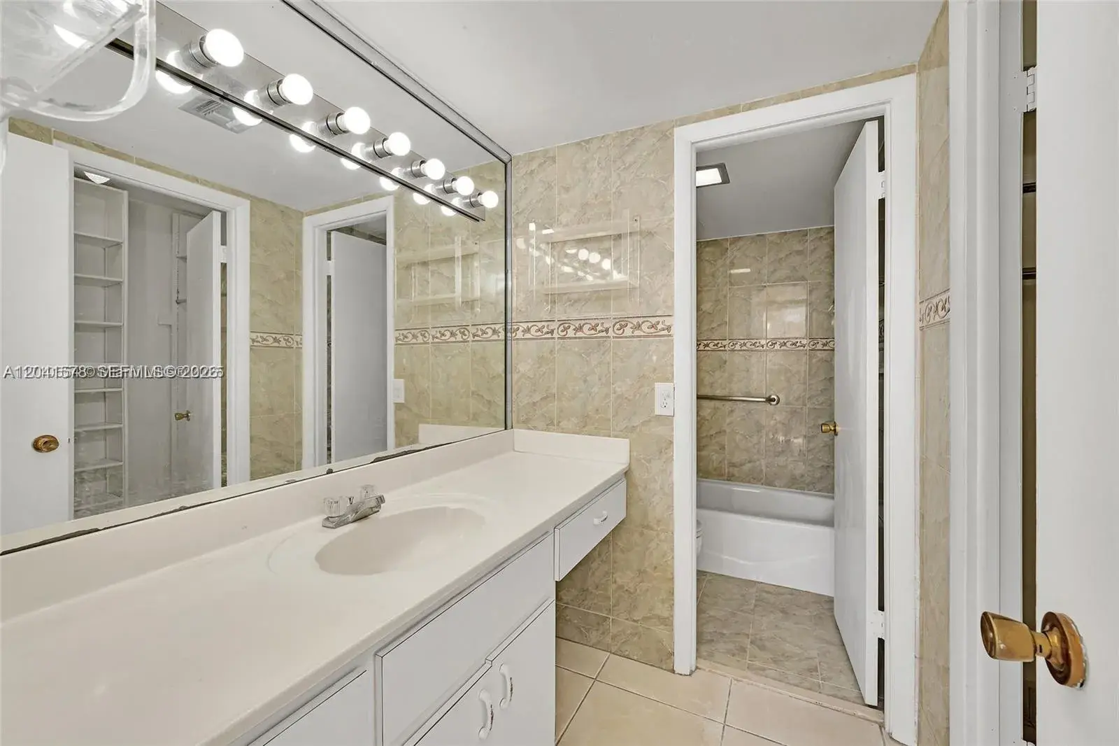 5050 NW 7th St # 202, Miami FL 33126