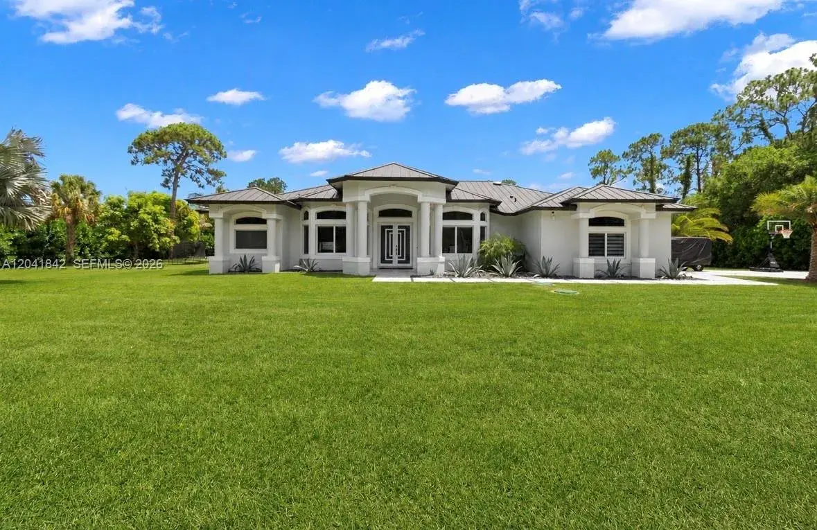 5 bedroom 3 bath for sale at 15436 N 92nd Ct N, Palm Beach FL 33412
