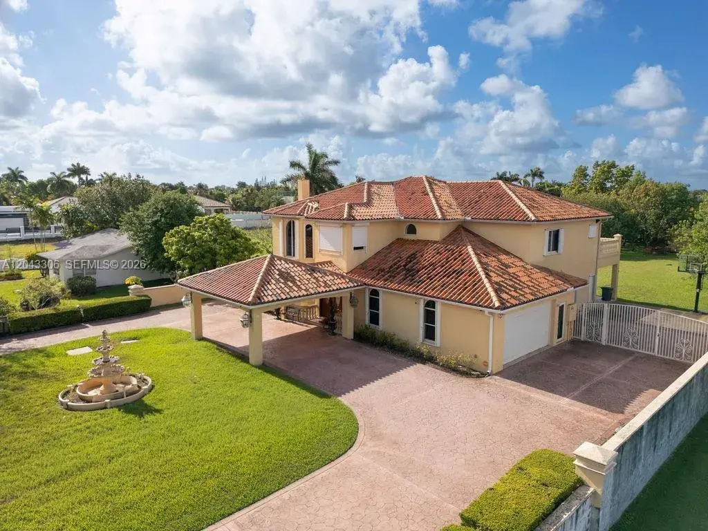 6 bedroom 6 bath for sale at 13370 SW 34th St, Miami FL 33175