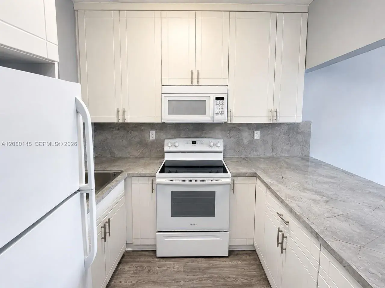 2 bedroom 1 bath Residential Lease for rent at 2400 NW 16th St Rd # 103, Miami FL 33125
