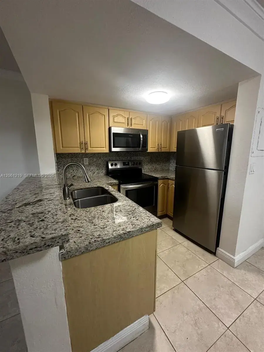 8660 NW 6th Ln # 103, Miami FL 33126