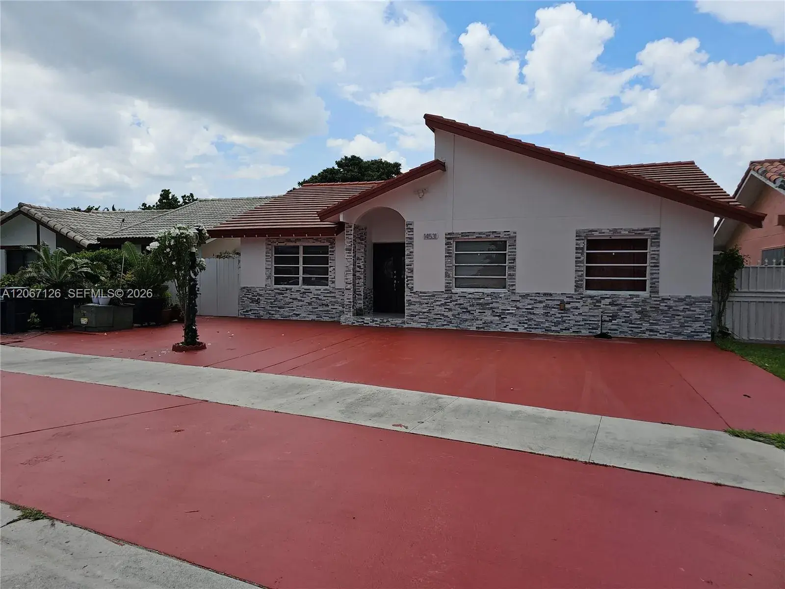 5 bedroom 3 bath Residential for sale at 14531 SW 97th St, Miami FL 33186