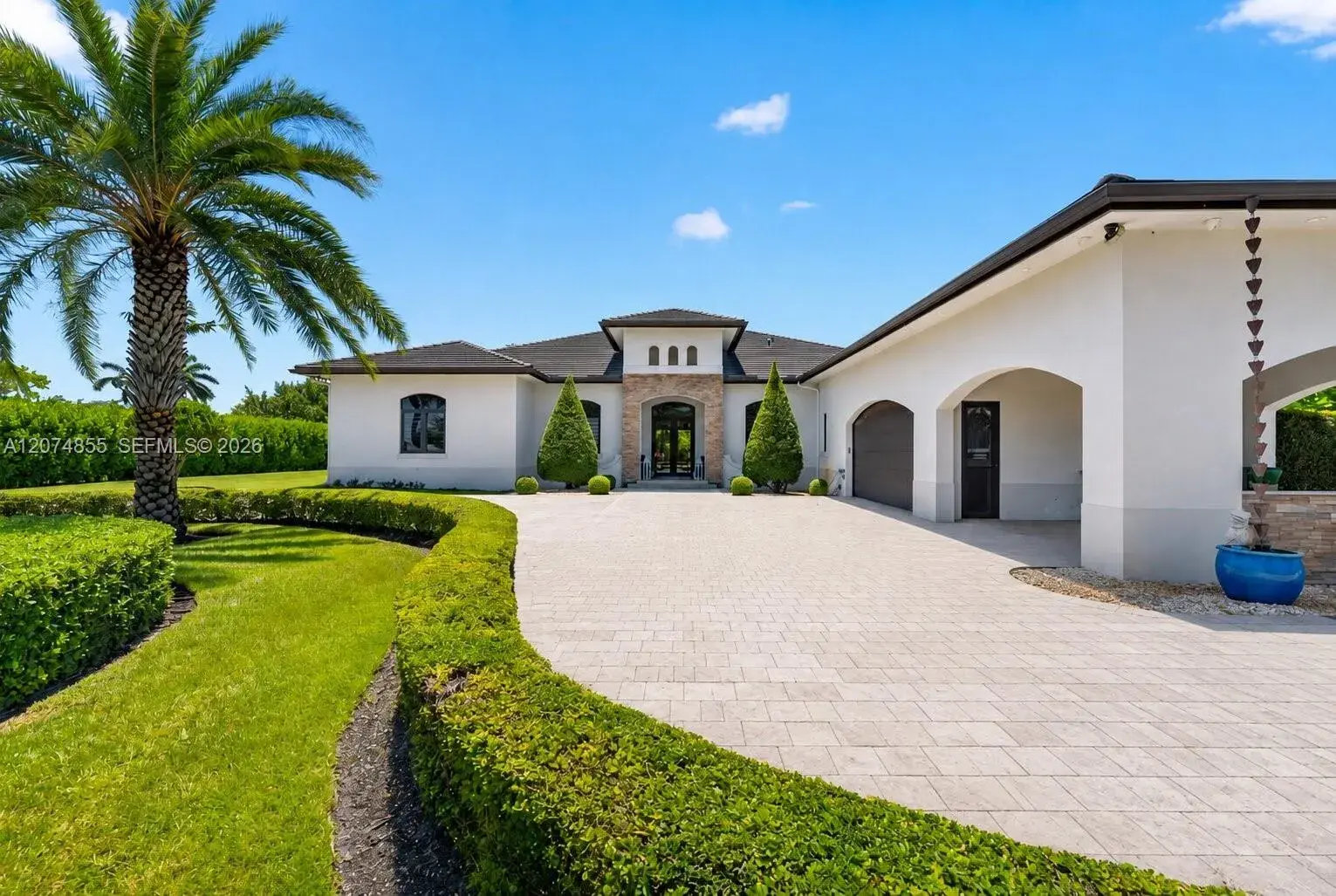 6 bedroom 6 bath Residential for sale at 10352 NW 131st St, Miami FL 33018