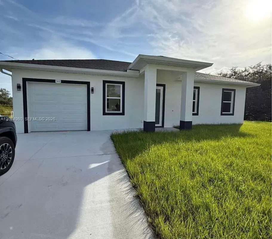 1832 Lindsay St, Lehigh Acres FL 33972