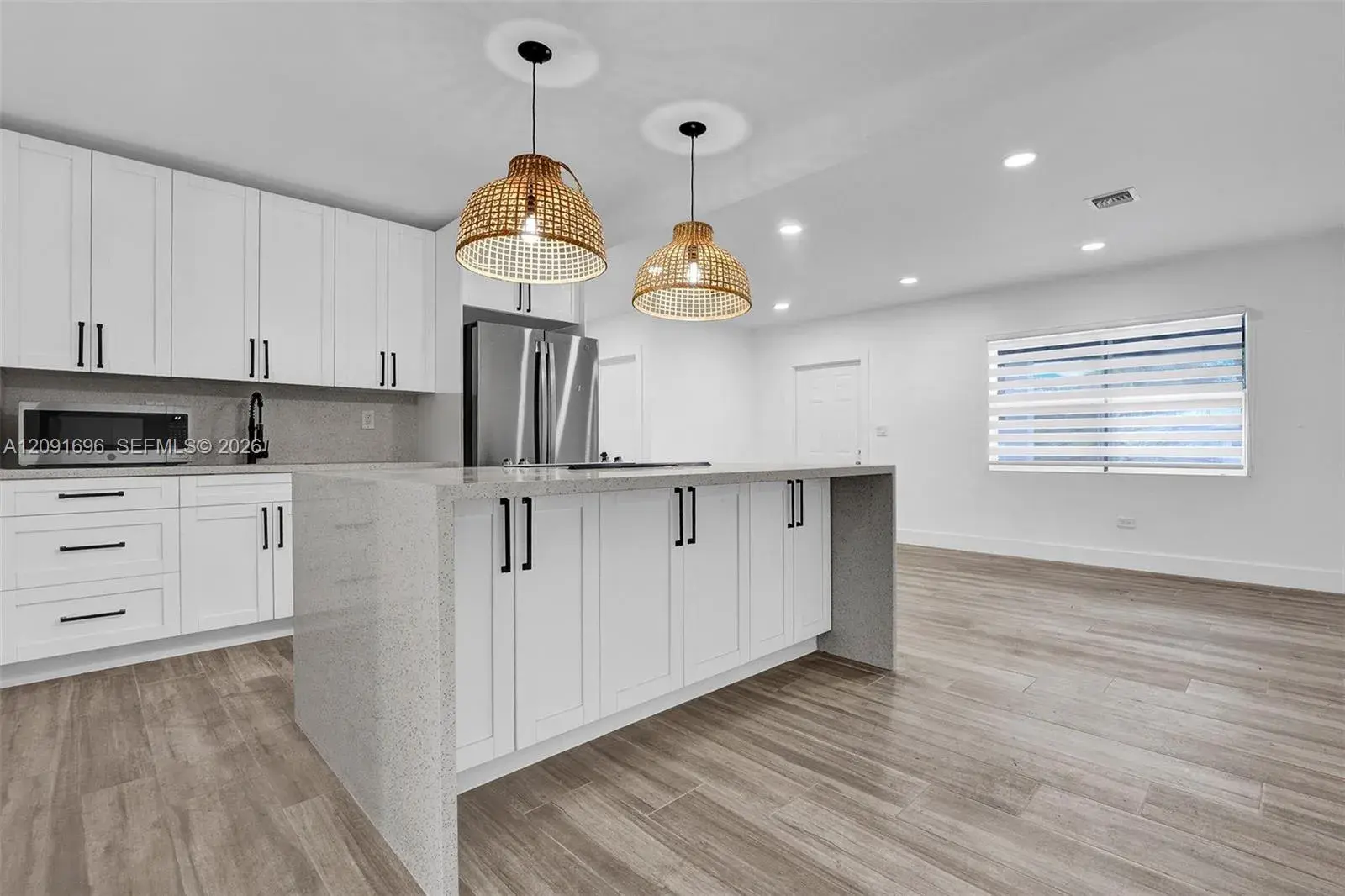 3 bedroom 2 bath Residential for sale at 75 NW 117th St, Miami FL 33168