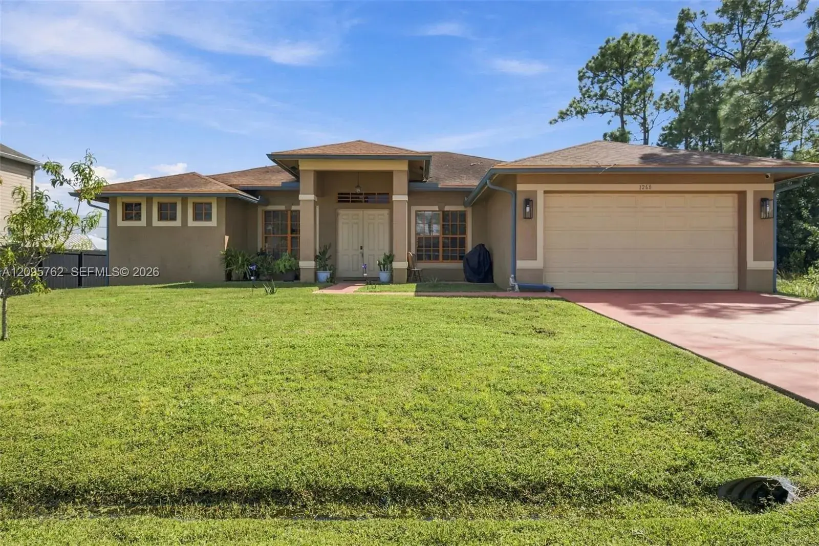 4 bedroom 3 bath Residential for sale at 1268 SW Patricia Ave, Port St. Lucie FL 34953