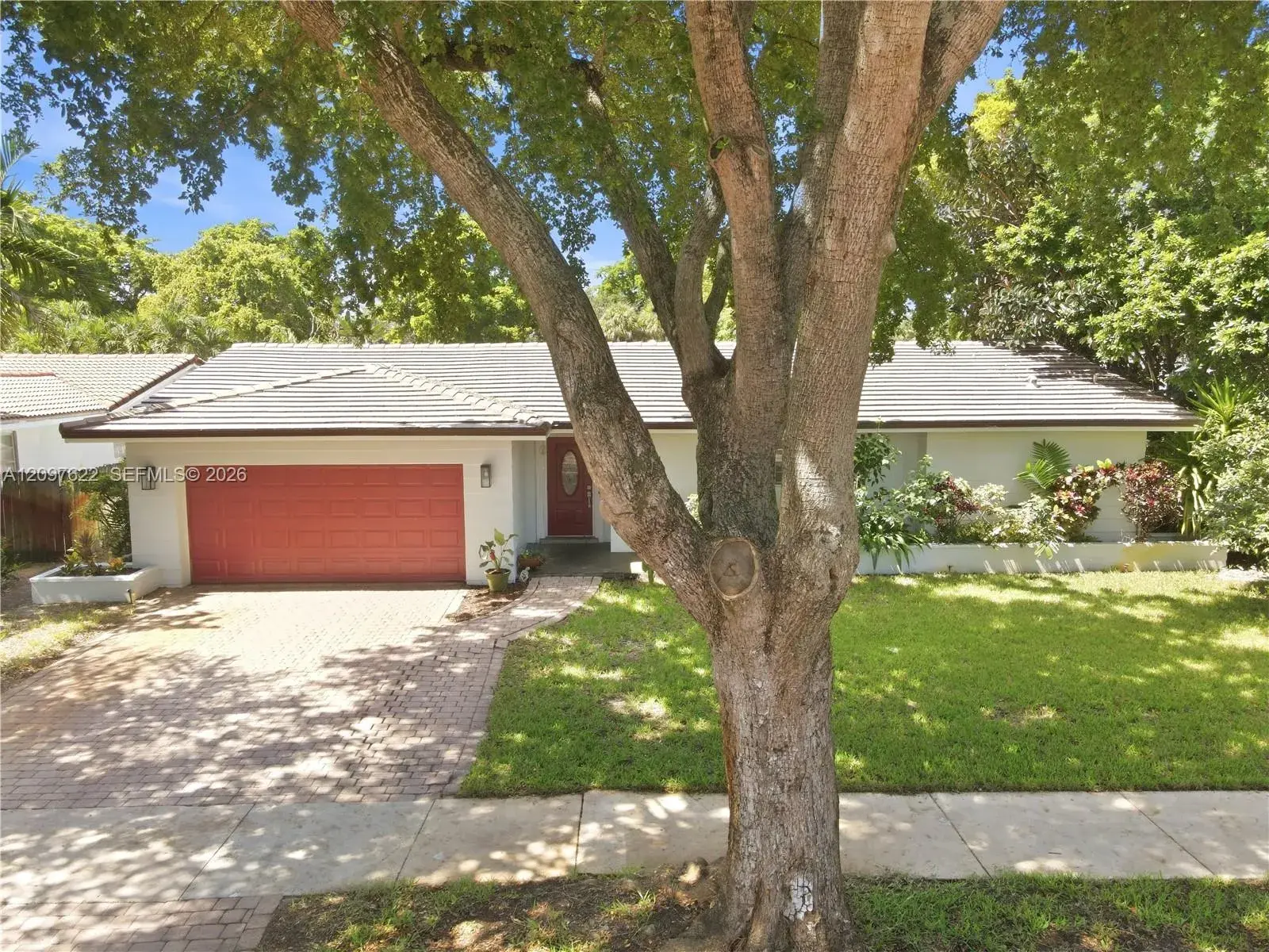 4 bedroom 2 bath Residential for sale at 16500 E Stonehaven Rd, Miami Lakes FL 33014