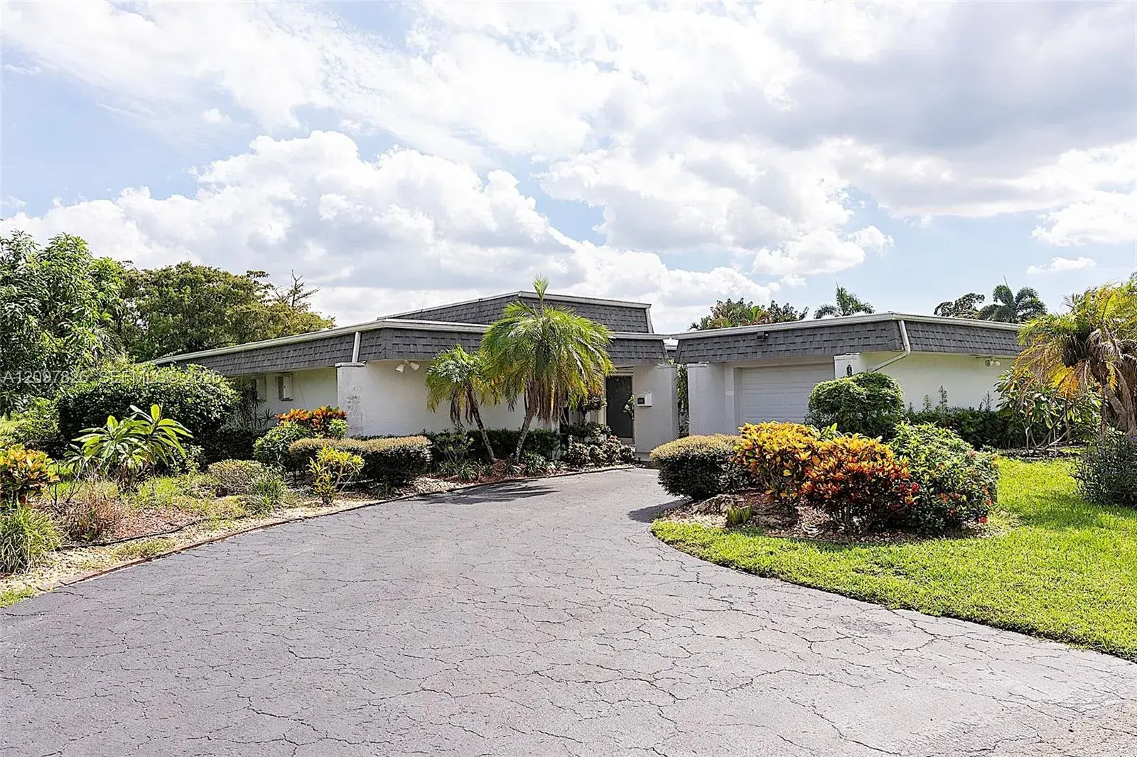 4 bedroom 2 bath Residential for sale at 5010 Banyan Ln, Tamarac FL 33319