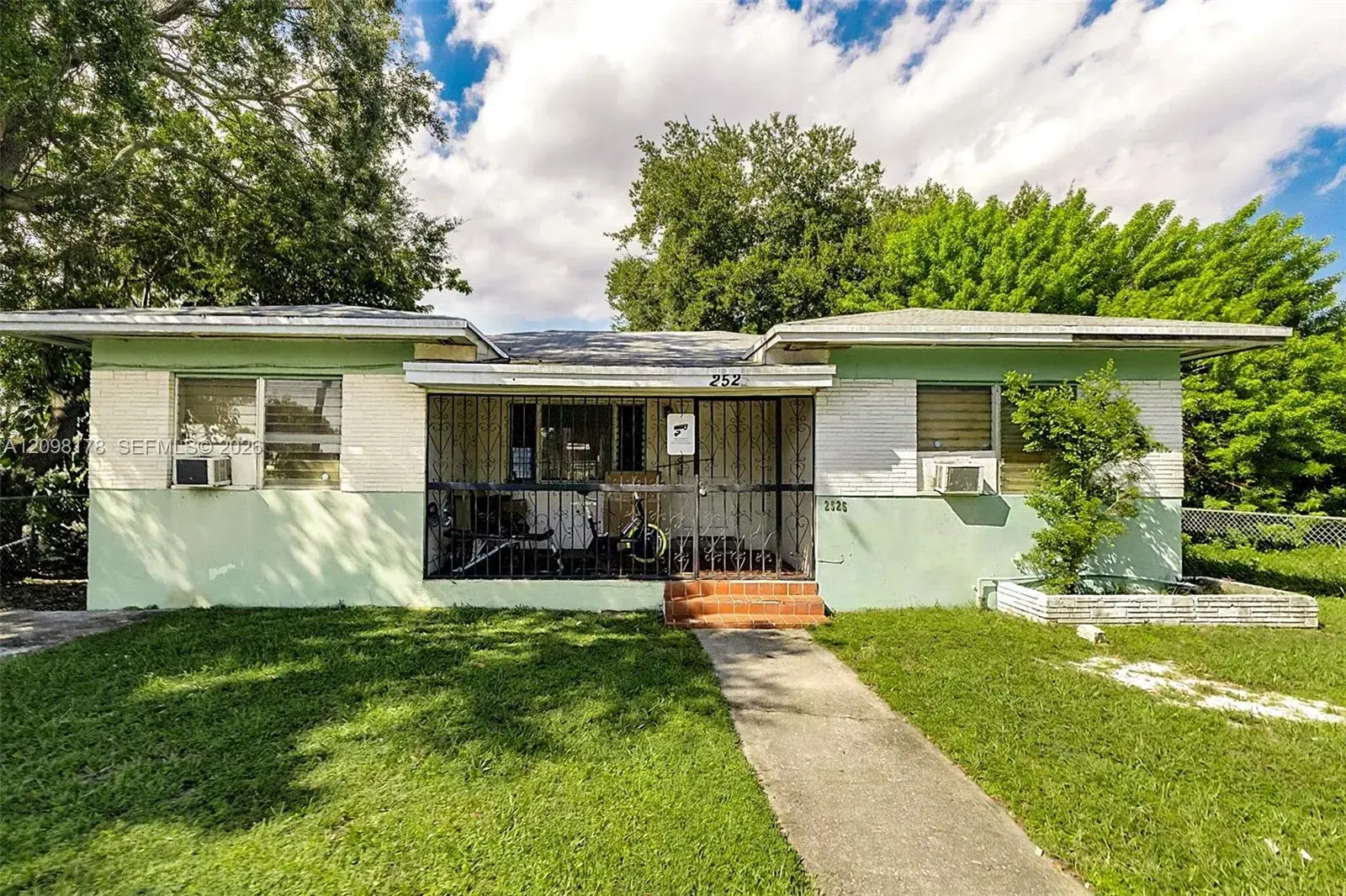 3 bedroom 2 bath Residential for sale at 2525 NW 50th St, Miami FL 33142