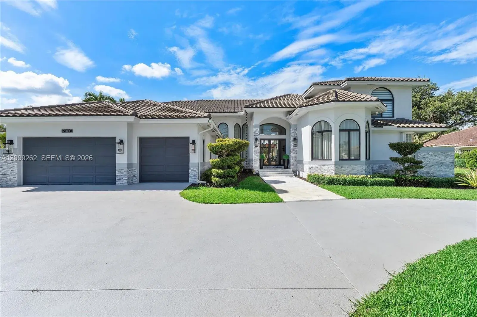 5 bedroom 4 bath Residential for sale at 12060 NW 10th St, Plantation FL 33323