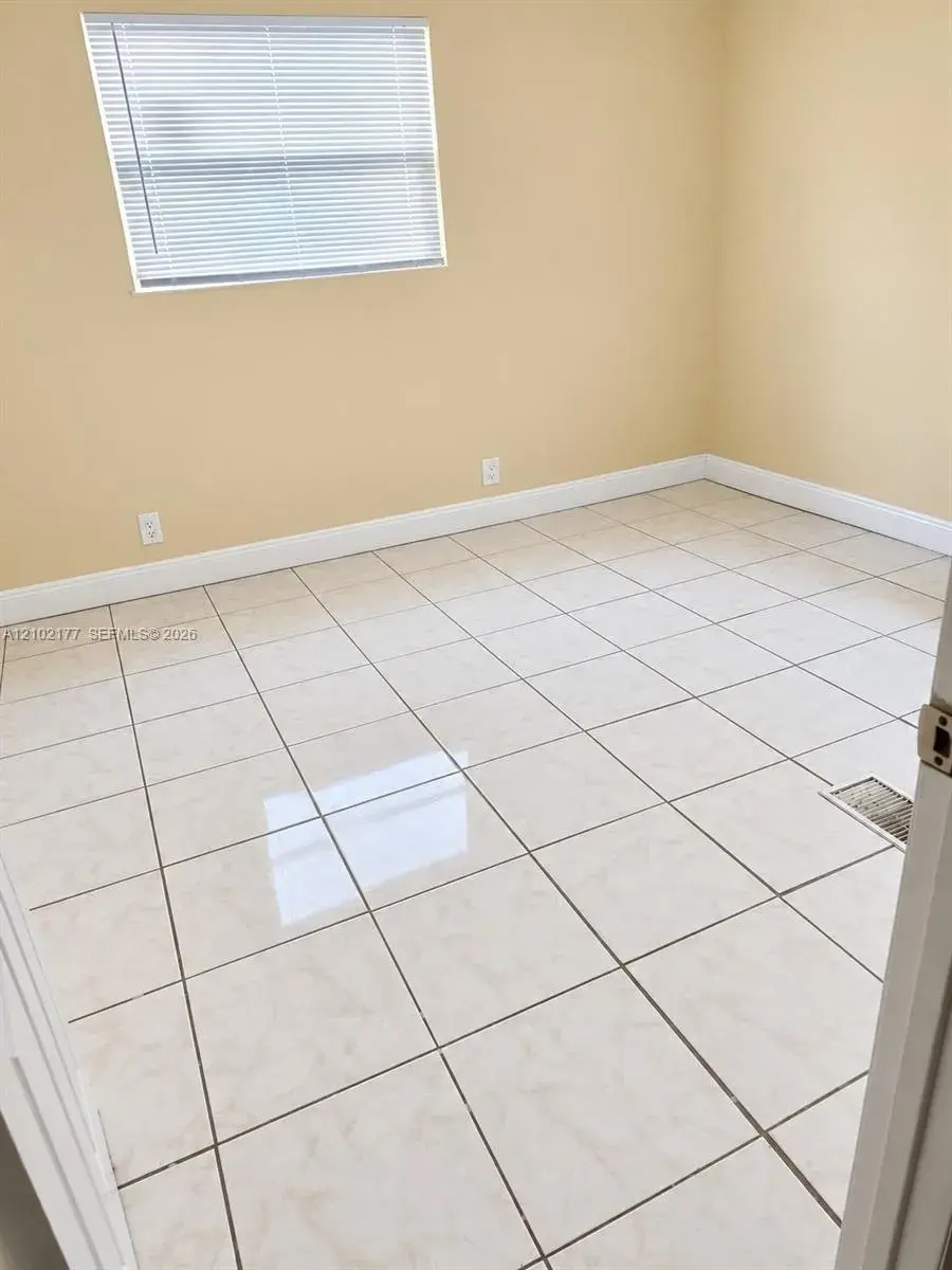 6 bedroom 4 bath Residential for sale at 3640 NW 39th St, Lauderdale Lakes FL 33309