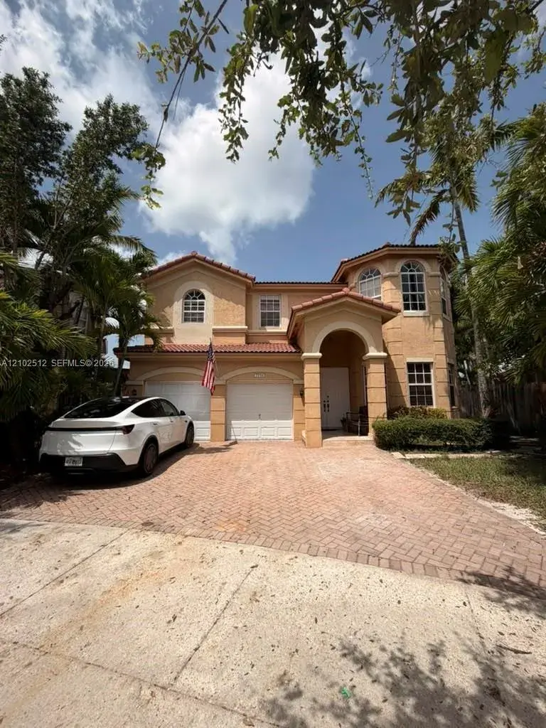 5 bedroom 4 bath Residential for sale at 7716 NW 113th Ave, Doral FL 33178