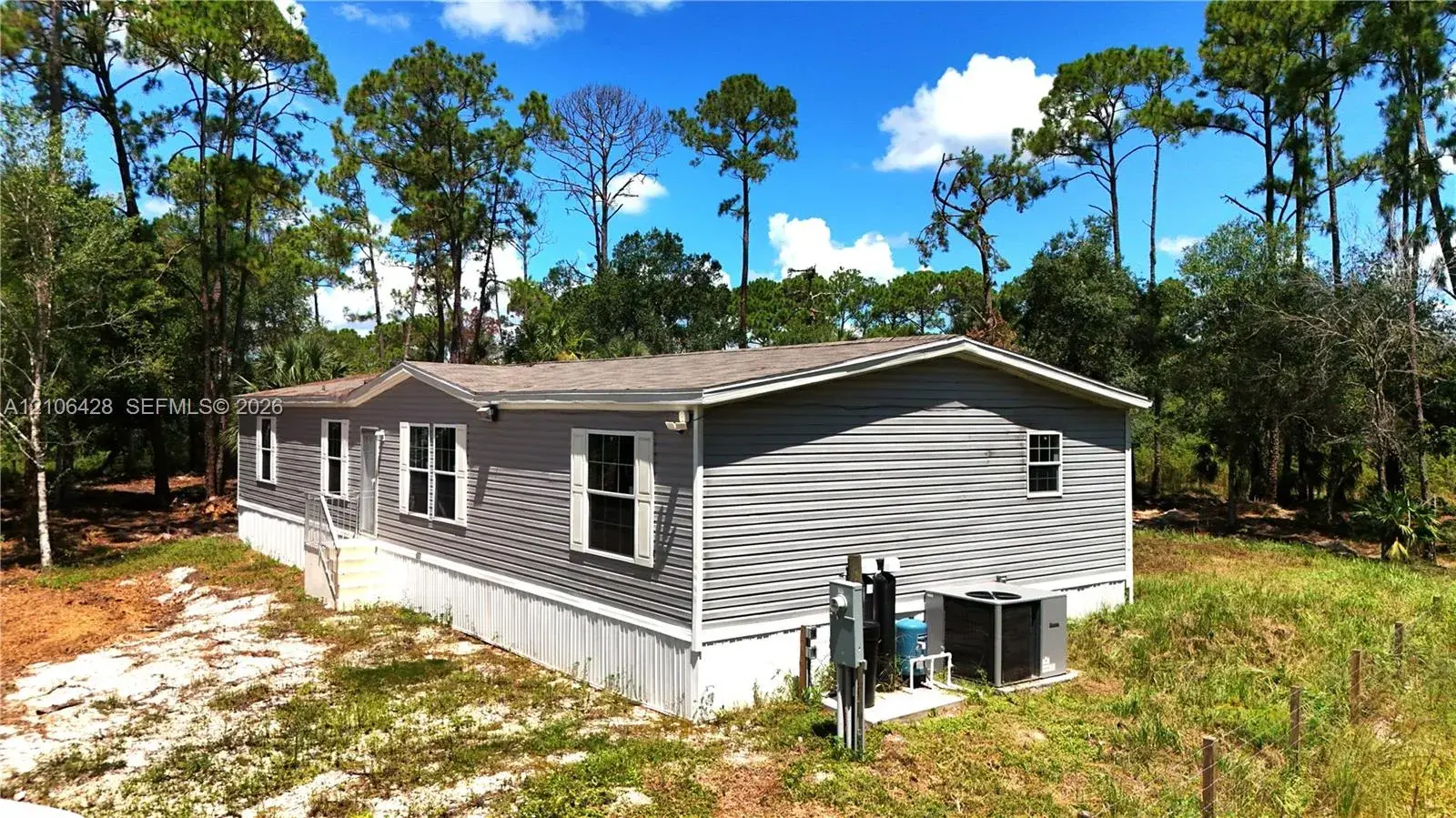 4 bedroom 2 bath Residential for sale at 881 Woodland Blvd, Clewiston FL 33440