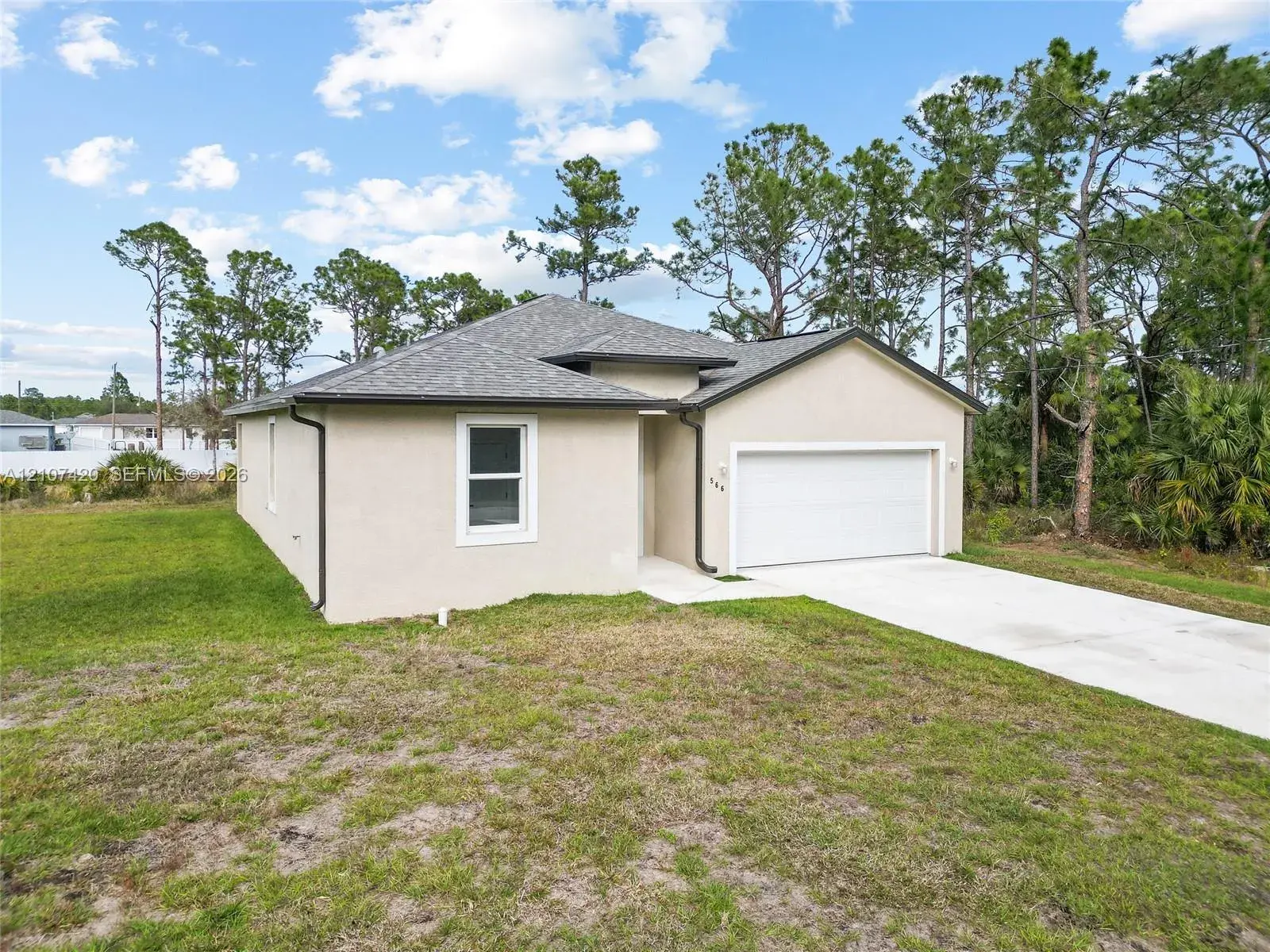 566 Woodview DR, Lehigh Acres FL 33972