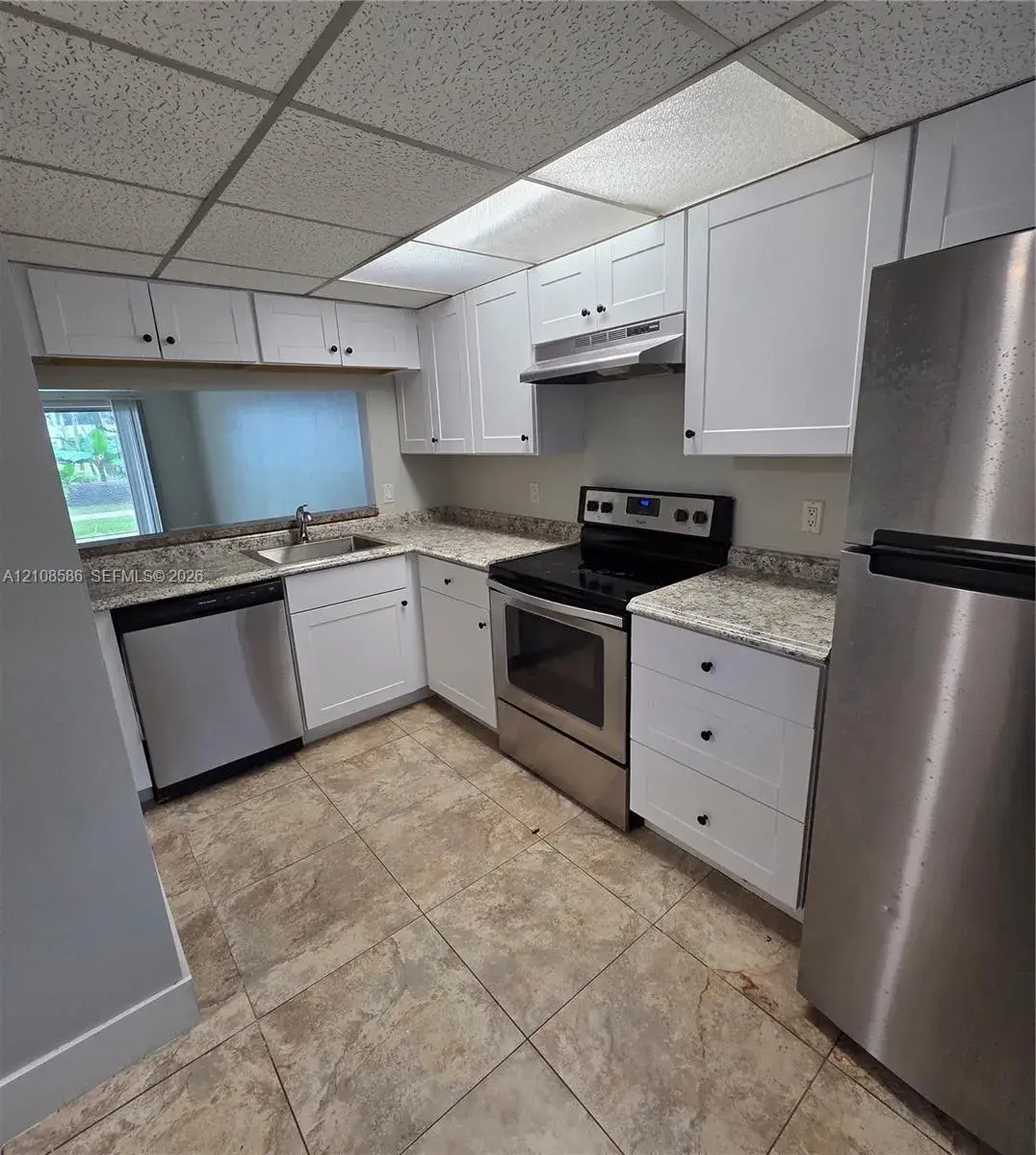 6075 N Sabal Palm Blvd # 110, Tamarac FL 33319