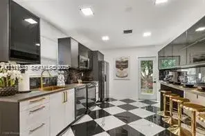 4 bedroom 3 bath Residential for sale at 919 NW 49th St, Miami FL 33127