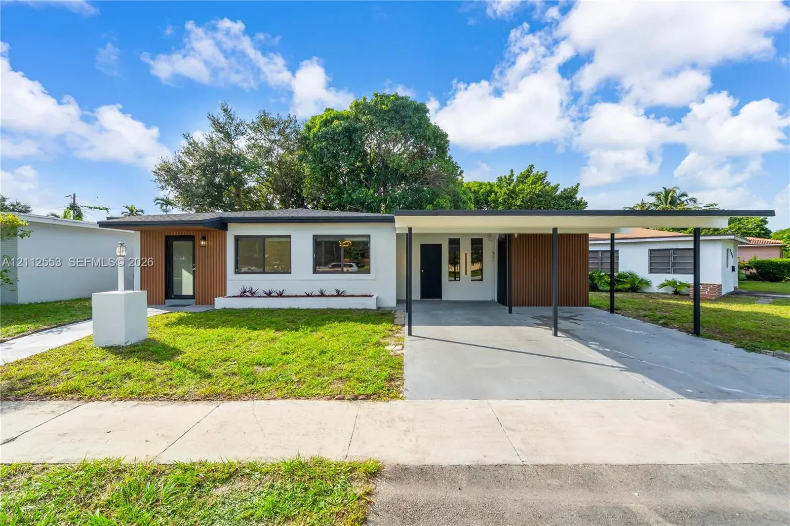 3 bedroom 2 bath Residential for sale at 1410 NE 161st St, North Miami Beach FL 33162