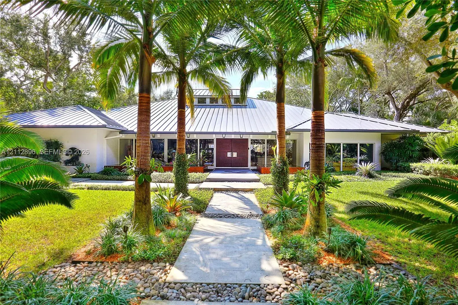 4 bedroom 4 bath Residential for sale at 5520 Oakwood Ln, Coral Gables FL 33156