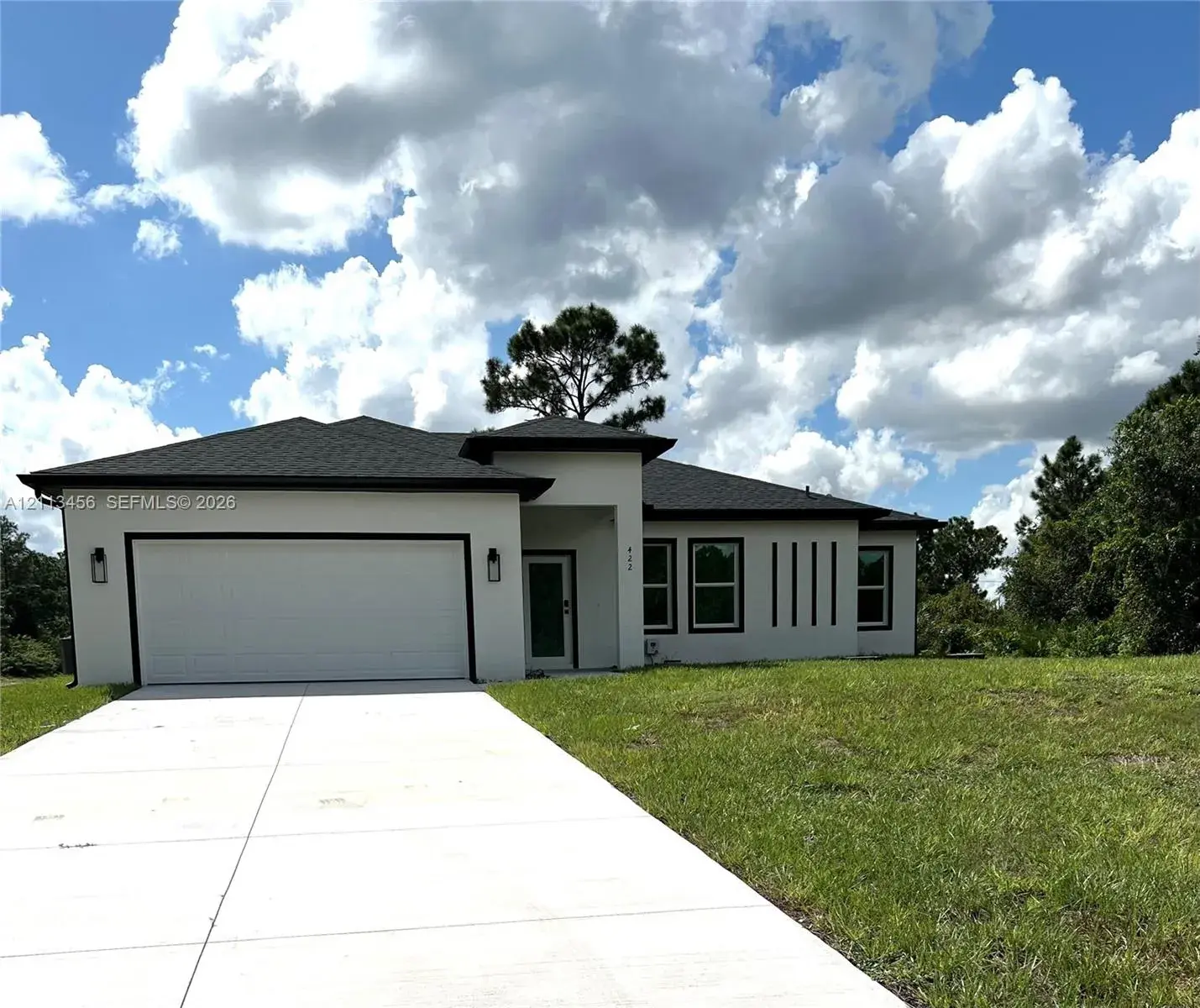4 bedroom 2 bath Residential for sale at 422 SE Eisenhower BLVD, Lehigh Acres FL 33974