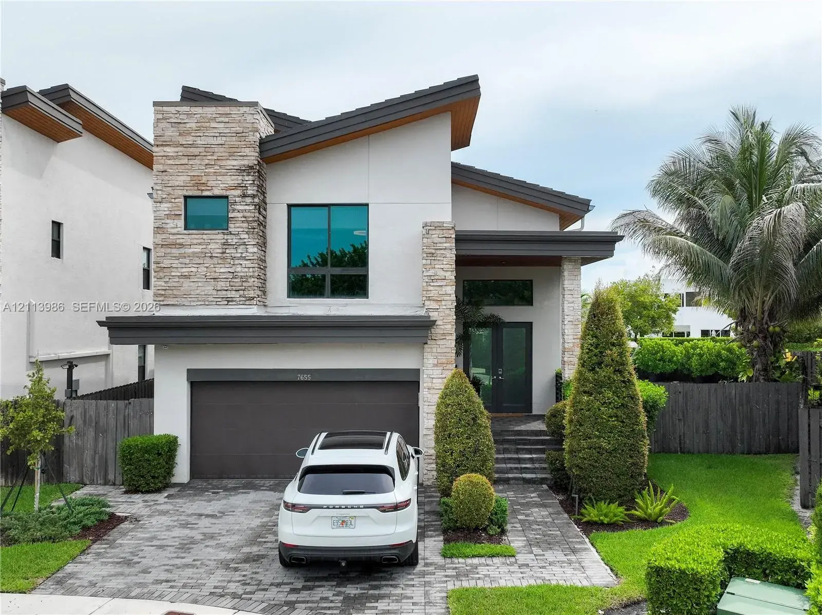 5 bedroom 4 bath Residential for sale at 7655 NW 102nd Ct, Doral FL 33178