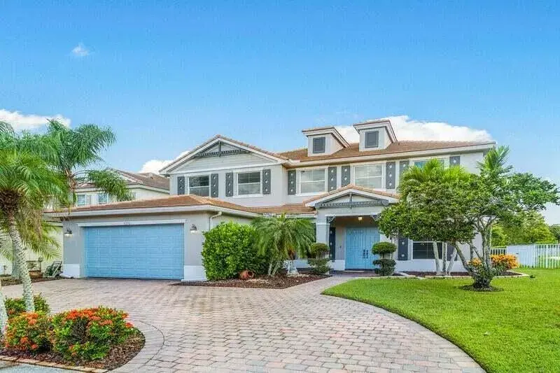5 bedroom 3 bath Residential Lease for rent at 9271 Madewood Court, West Palm Beach FL 33411