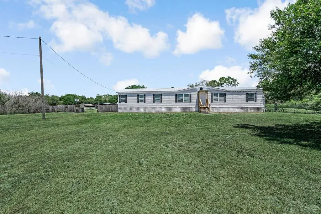 4 bedroom 2 bath Residential for sale at 545 Bald Cypress Avenue, Clewiston FL 33440