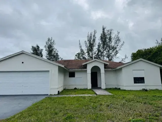 4 bedroom 2 bath Residential for sale at 12836 78th Place N, West Palm Beach FL 33412