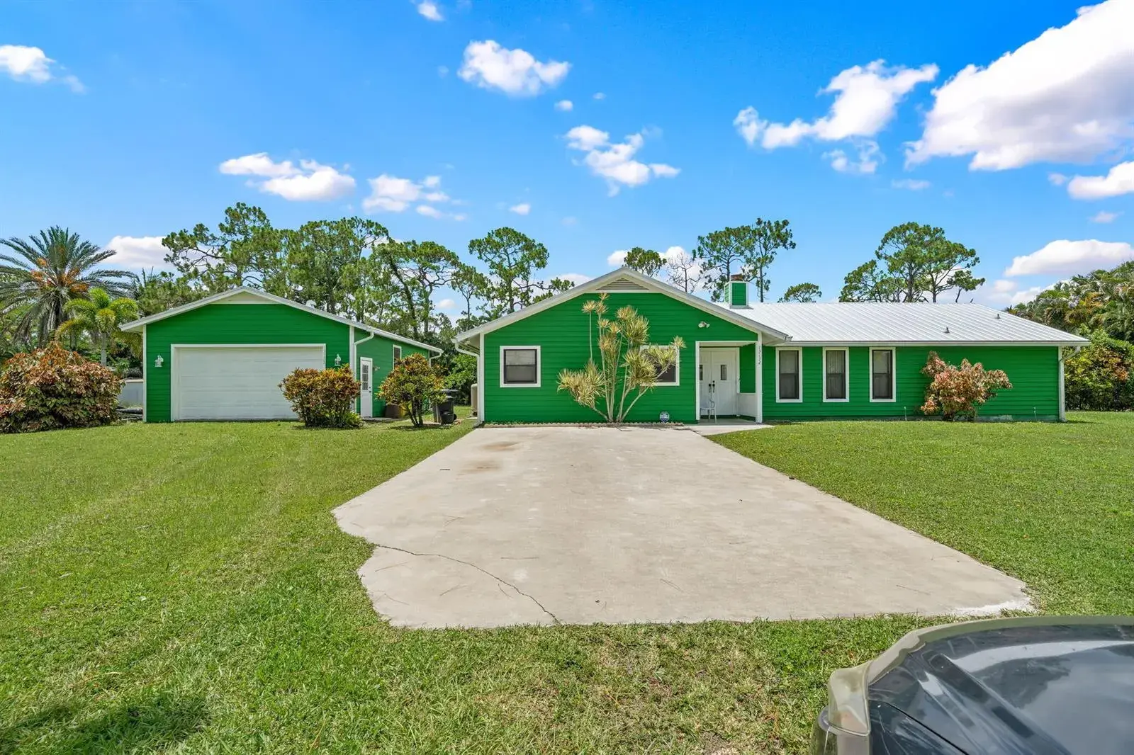 4 bedroom 3 bath Residential for sale at 13132 56th Place N, West Palm Beach FL 33411